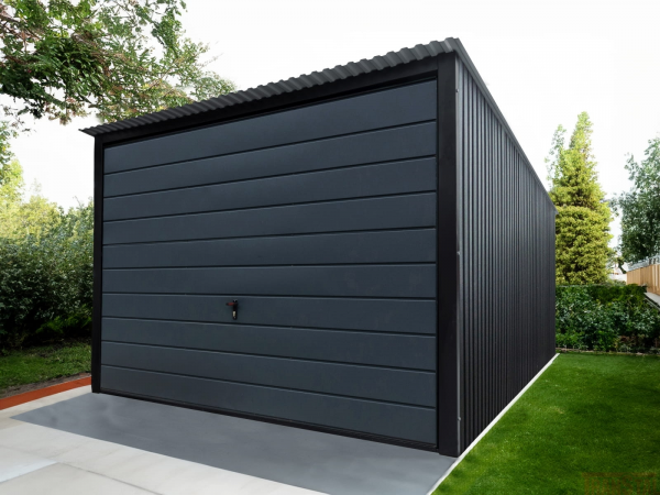 Modern dark grey metal garage with horizontal paneling and a large overhead door.